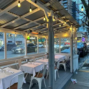 tables and chairs outside a restaurant