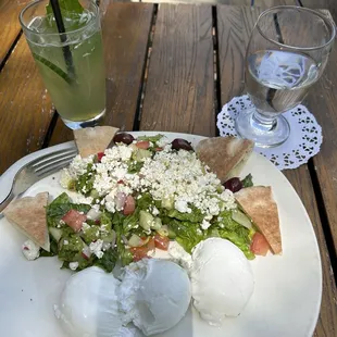 A lovely Mediterranean salad with a delicious mocktail while people-watching outside on a beautiful Saturday afternoon.