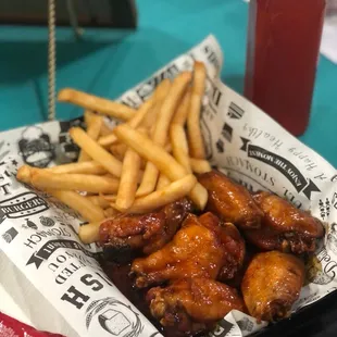 Memphis Mild Wings, Kool-Aide, and seasoned fries.
