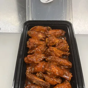 a tray of chicken wings
