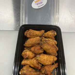 a tray of chicken wings