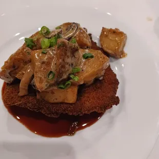 Deep fried pork loin potatoes with mushrooms and sauce