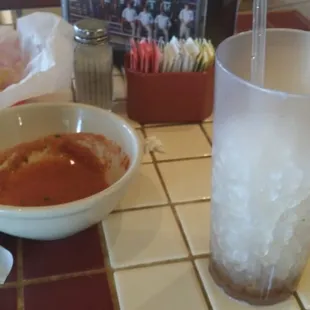 Bad service, bad food, and an empty glass.The food took entirely too long to arrive at our table. Don't bother.