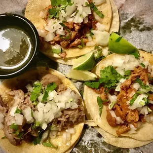 Another shot of the street tacos with verde hot sauce.