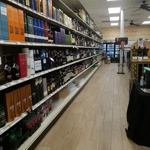 the aisle of a liquor store