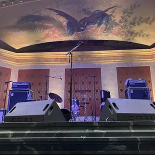 a stage with a band playing