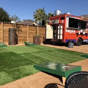 a food truck parked in the background