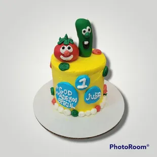 a cake decorated with vegetables