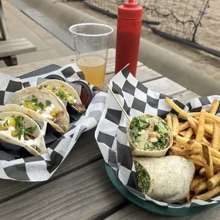 El Pastor Tacos and Chicken Caesar Wrap