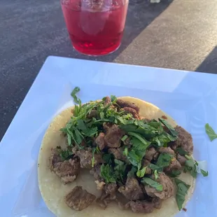 a taco with meat and vegetables