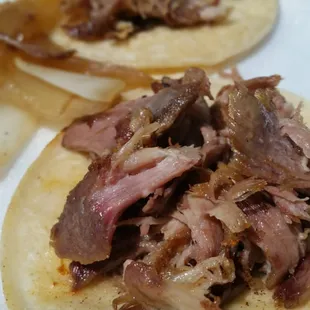 Carnitas.. good flavor, but bit into a piece of bone. :(