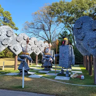 a group of sculptures in a park