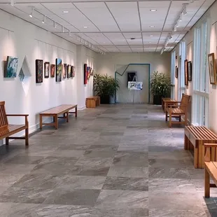 a long corridor with benches