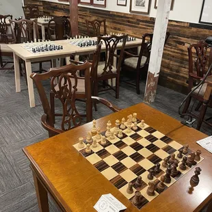 a chess board and chairs