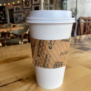 a cup of coffee on a table