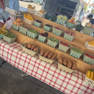a man selling fruit and vegetables