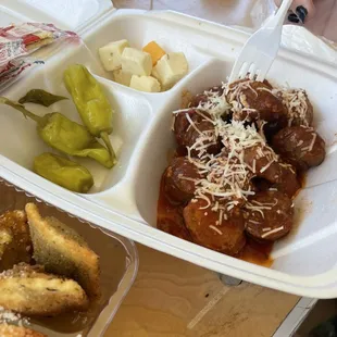 Sausage Cheese Plate.  Weird with Italian sausage and sauce on it.