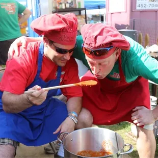 Tasting gravy (for some reason spaghetti sauce is called gravy at this Festival)!