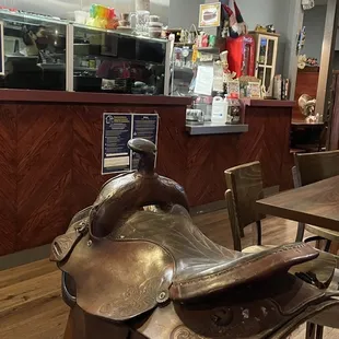 a horse saddle in a restaurant