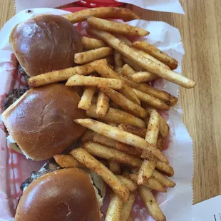 two burgers and french fries