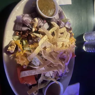 a plate of mexican food on a table