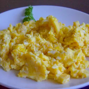 a plate of scrambled eggs
