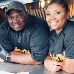 My wife and I serve with a smile