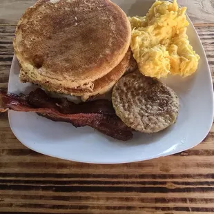 Chefs Breakfast: 3 pancakes, 3 pieces of bacon, 1 sausage patty, &amp; eggs.