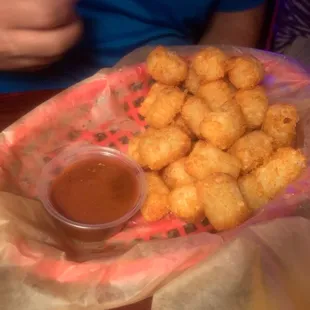 Tots with bbq sauce on side