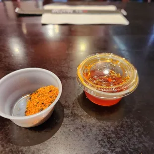 Chili flakes and chili oil to bring up the heat.