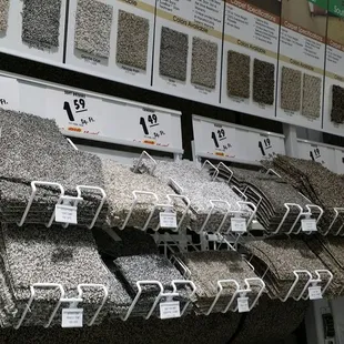 a variety of carpet samples in a store