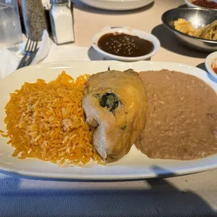 Brisket Chili Relleno with refried beans &amp; rice