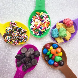 a variety of scoops of candy