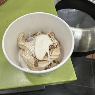 Caramel Apple Pie with coconut, almonds and marshmellow sauce