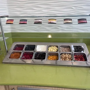 Toppings bar with fresh fruit and boba as options
