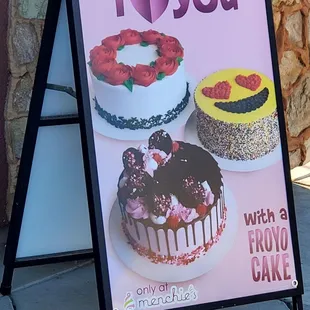 A sign showing off the cakes they make with frozen yogurt/froyo! I saw them bring out two beautiful cakes while inside.