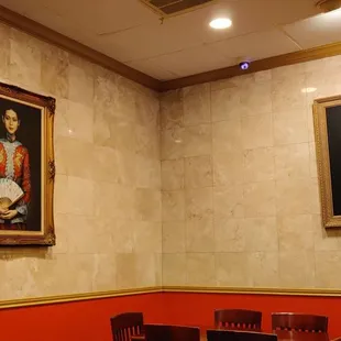 two paintings on the wall