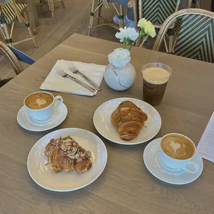 hot latte and cappuccino, almond croissant, butter croissant, nitro cold brew