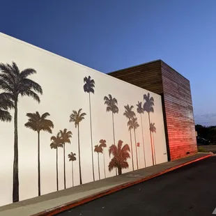 Take a picture by this mural. So fun. Across from them.