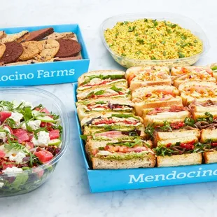 a variety of sandwiches and salads