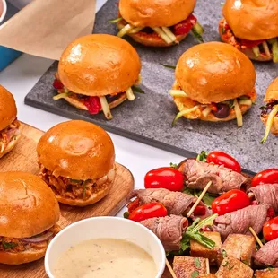 a tray of mini burgers