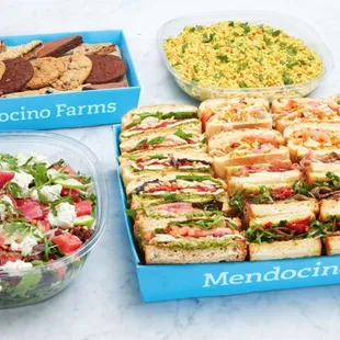 a variety of sandwiches and salads