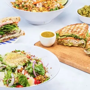 a variety of sandwiches and salads