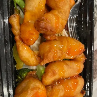 a tray of chicken and broccoli