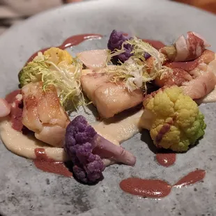 scallops, broccoli, and cauliflower on a plate