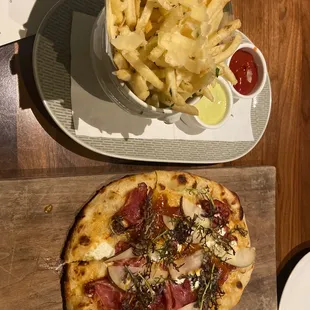 a pizza and french fries