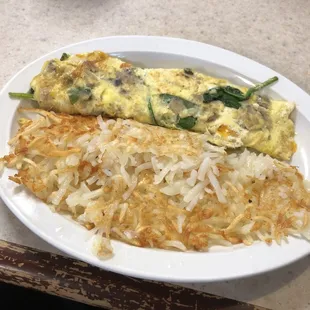 Spinach, mushroom, and cheddar cheese omelette