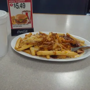 Just got the chili cheese special of the day...mmm tasty I already devoured into the right side of it.