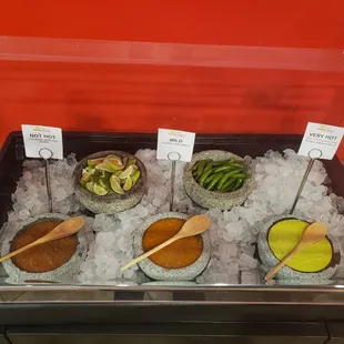 Salsa bar (warning green is NOT guacamole)