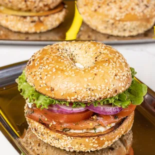 a stack of bagels on a tray